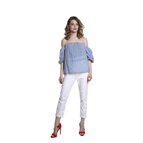 Maglia senza spalle e pantaloni in tessuto